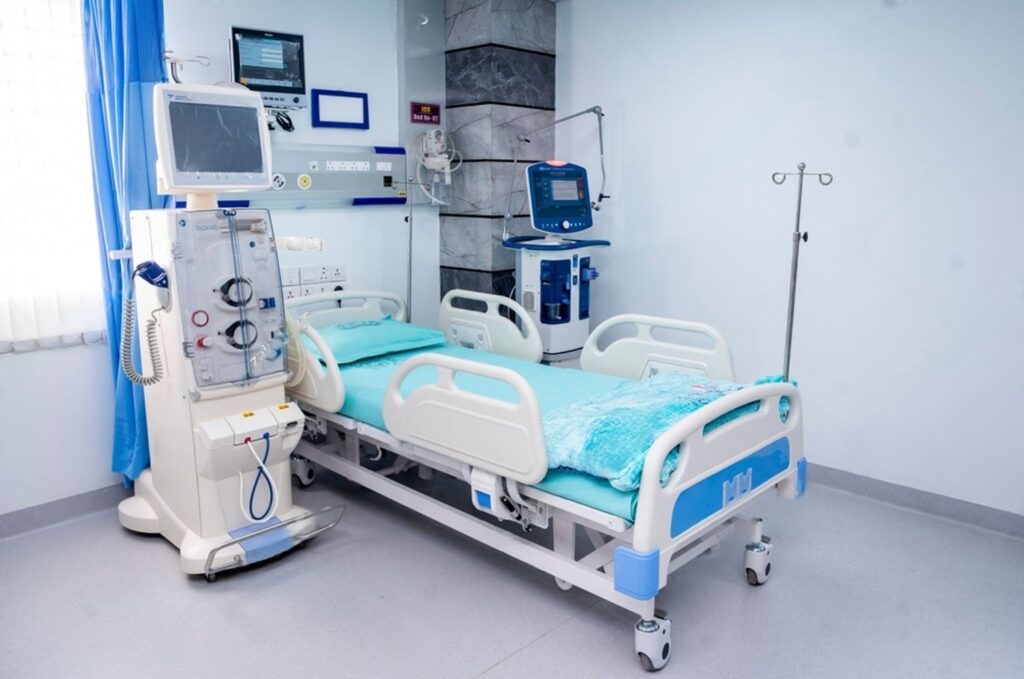 ICU at Home setup with hospital bed, ventilator, patient monitor and medical equipment by SK Healthcare At Home